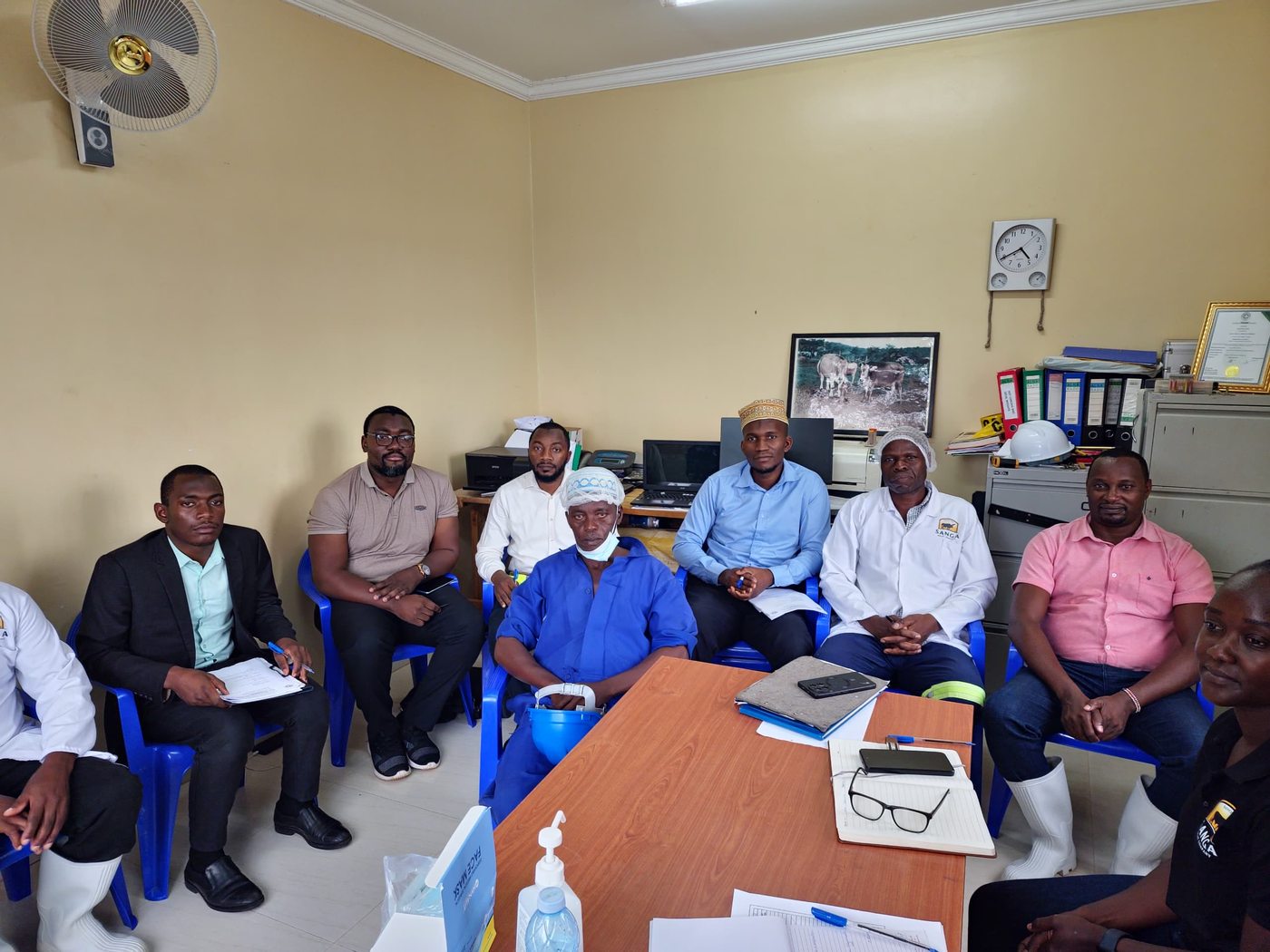 UHB audit team in a closing meeting at a processing facility